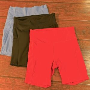 All in Motion set of 3.  Like new.  Watermelon red, black, blue